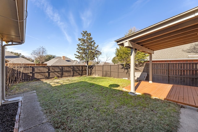 view of yard with a deck