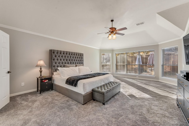 carpeted bedroom with ceiling fan and crown molding