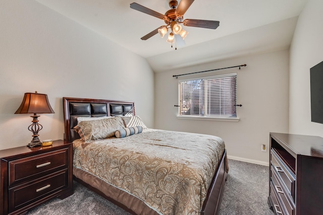 carpeted bedroom with ceiling fan and vaulted ceiling