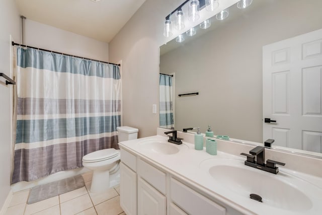 full bathroom featuring tile patterned floors, vanity, toilet, and shower / bath combination with curtain