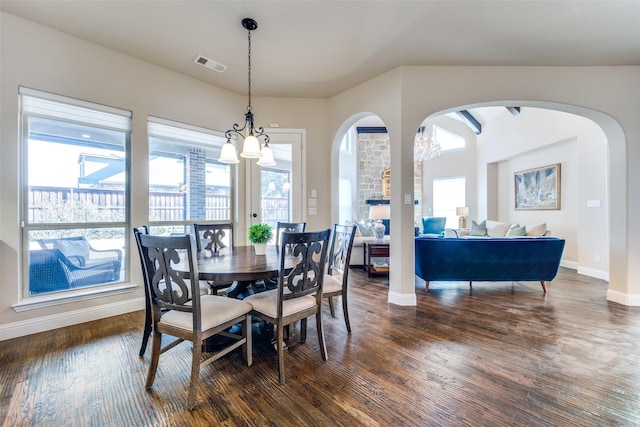 dining room with dark hardwood / wood-style floors