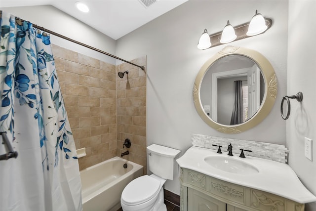 full bathroom with vanity, toilet, shower / tub combo, and backsplash