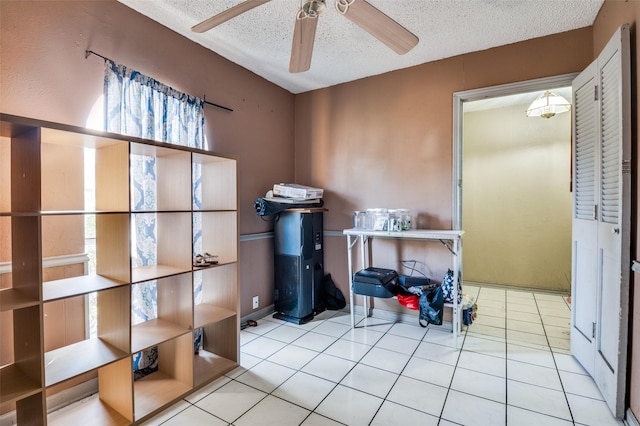 interior space featuring ceiling fan