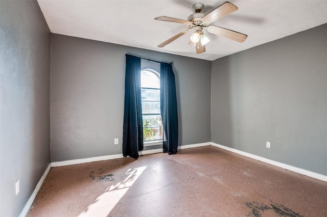 unfurnished room featuring ceiling fan