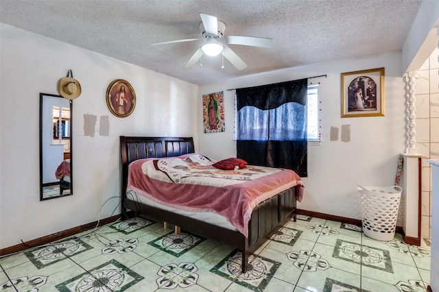 bedroom featuring a textured ceiling and ceiling fan