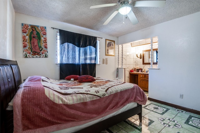 bedroom featuring ceiling fan, a textured ceiling, and light tile patterned floors