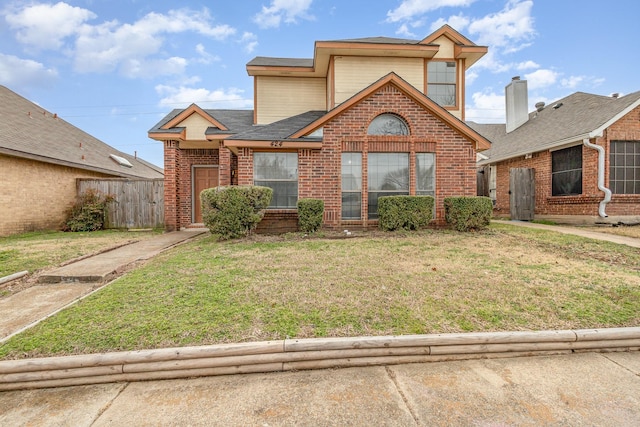 front facade featuring a front lawn