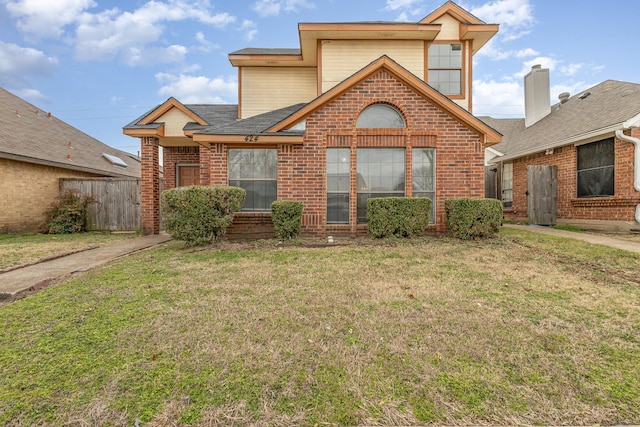 view of property with a front lawn