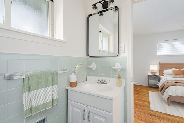 bathroom featuring vanity and wood-type flooring