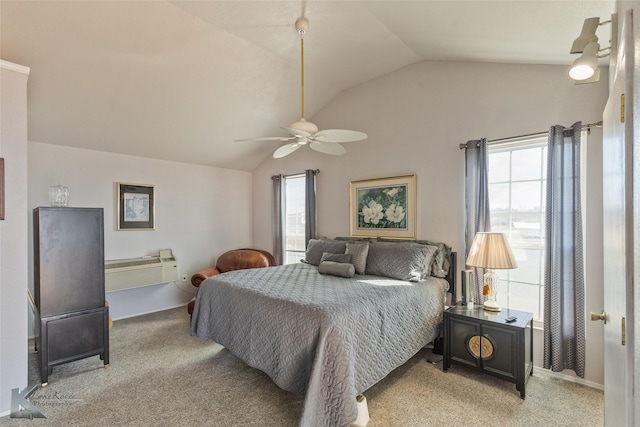 bedroom with light colored carpet, ceiling fan, and vaulted ceiling