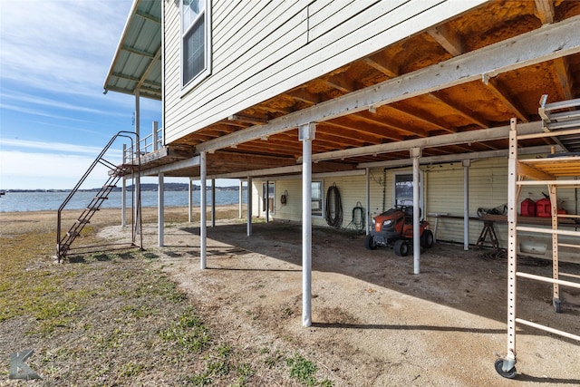 exterior space with a water view