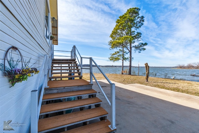 exterior space with a water view