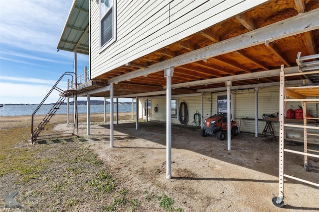 view of patio featuring a water view