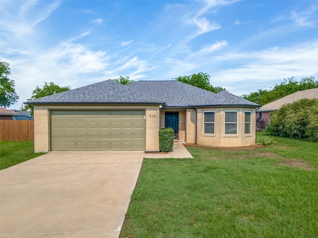 ranch-style home with a front yard and a garage