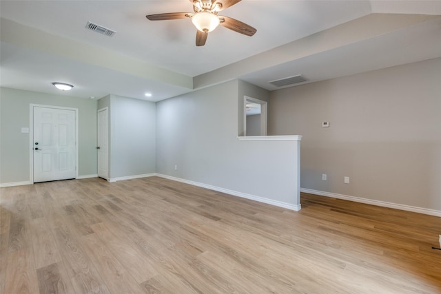 unfurnished room featuring light hardwood / wood-style flooring and ceiling fan