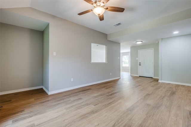 spare room featuring light hardwood / wood-style floors and ceiling fan