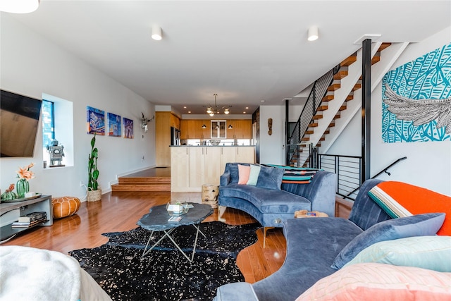 living room with hardwood / wood-style flooring and a wealth of natural light