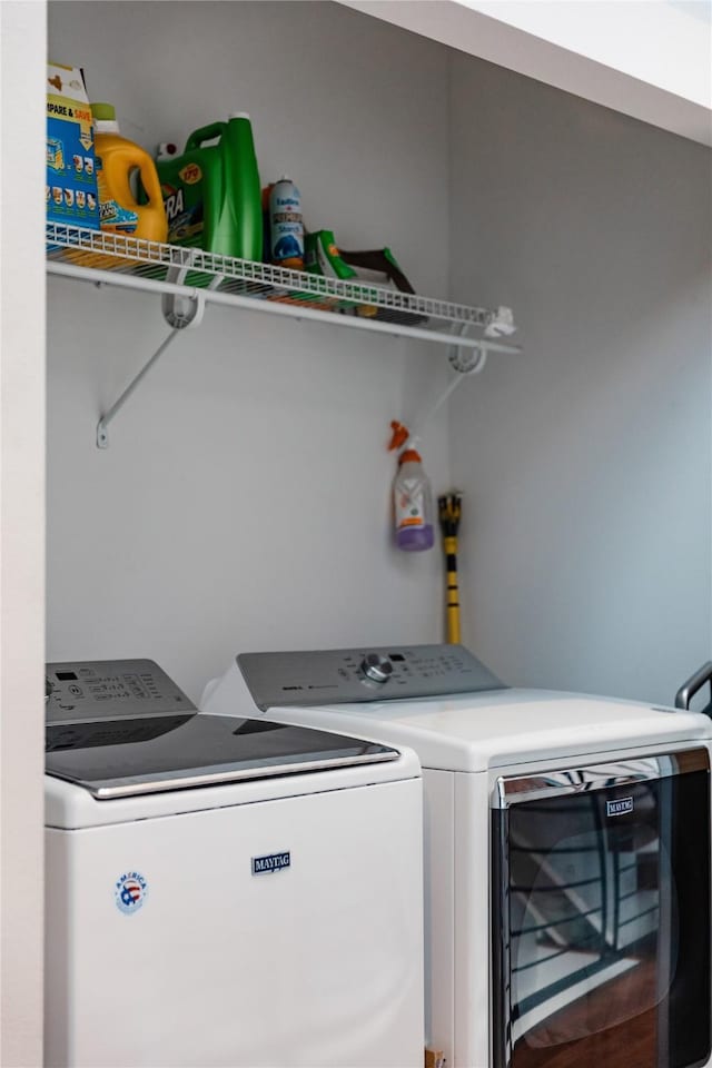 laundry area with washer and clothes dryer