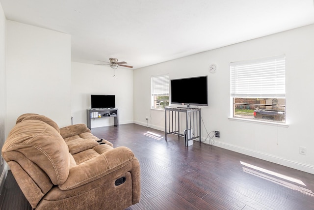 7221 Chinaberry Rd, Dallas, TX 75249 - living area featuring a ceiling fan, dark wood-style flooring, and baseboards