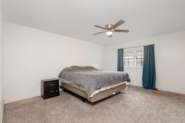 7221 Chinaberry Rd, Dallas, TX 75249 - bedroom with light colored carpet, baseboards, and a ceiling fan