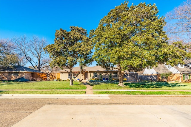 view of front of home with a front lawn