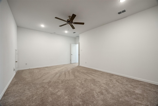 carpeted empty room with ceiling fan