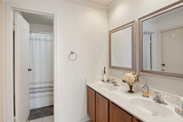 bathroom featuring a shower with shower curtain, vanity, crown molding, and tile patterned flooring