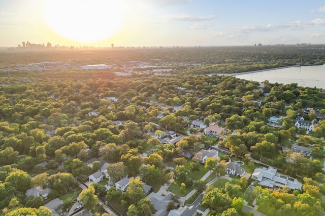 aerial view at dusk with a water view