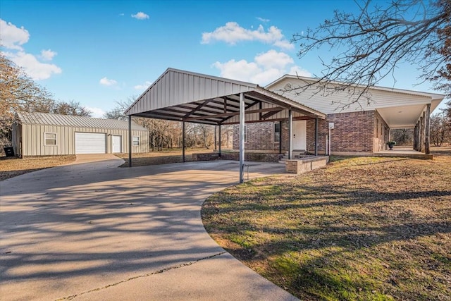 exterior space with an outbuilding and a lawn