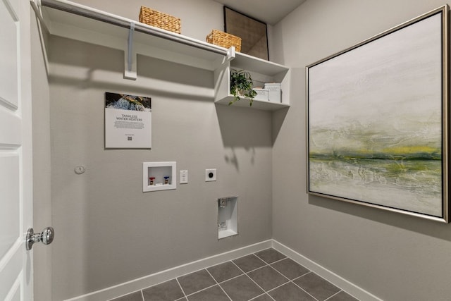 clothes washing area with hookup for an electric dryer, hookup for a washing machine, and dark tile patterned floors