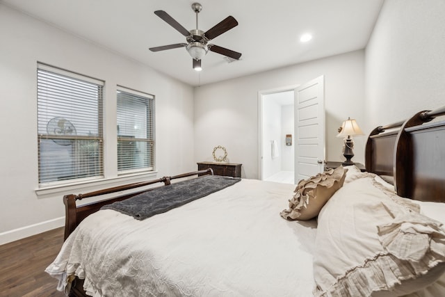 bedroom featuring ceiling fan and dark hardwood / wood-style flooring