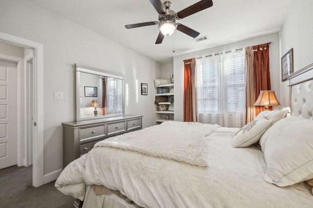 carpeted bedroom with ceiling fan