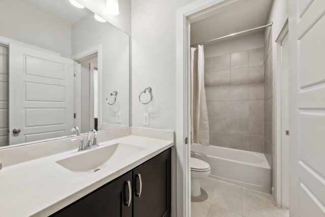 full bathroom featuring toilet, vanity, shower / bath combo, and tile patterned flooring