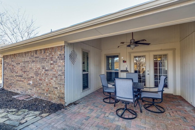 view of patio featuring ceiling fan and french doors