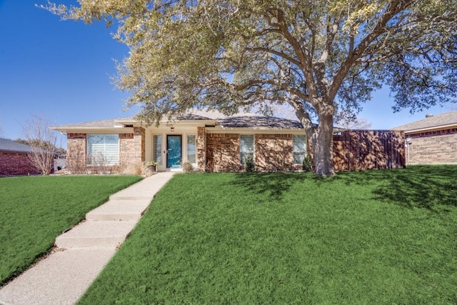 ranch-style house with a front yard