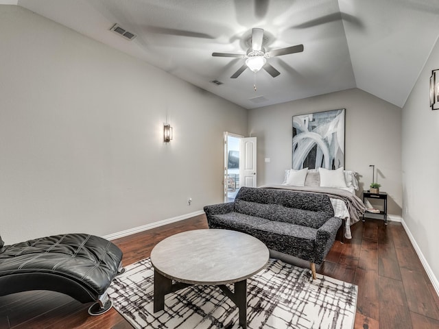 bedroom with vaulted ceiling, dark hardwood / wood-style floors, and ceiling fan