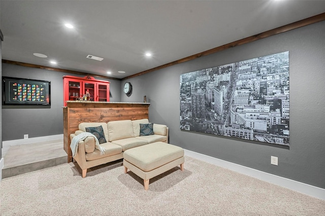 carpeted living room with crown molding