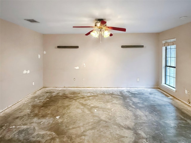 spare room with concrete flooring