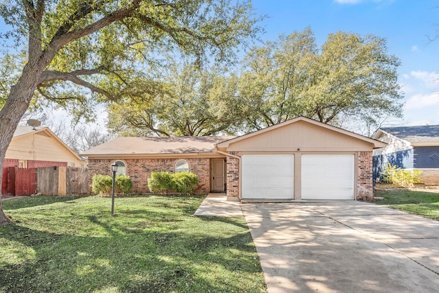 single story home with a garage and a front lawn