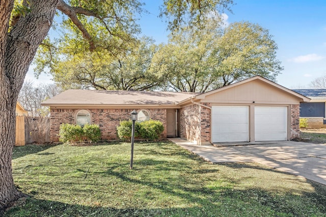 single story home with a garage and a front lawn