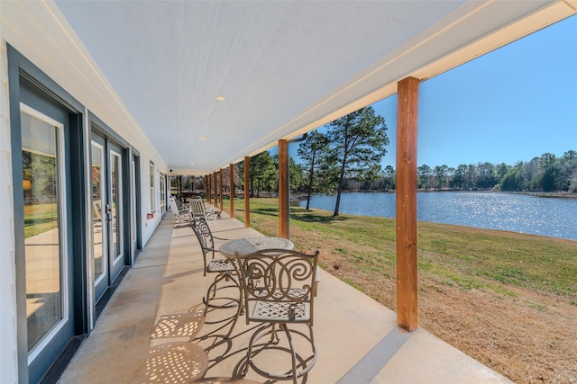 view of patio / terrace featuring a water view