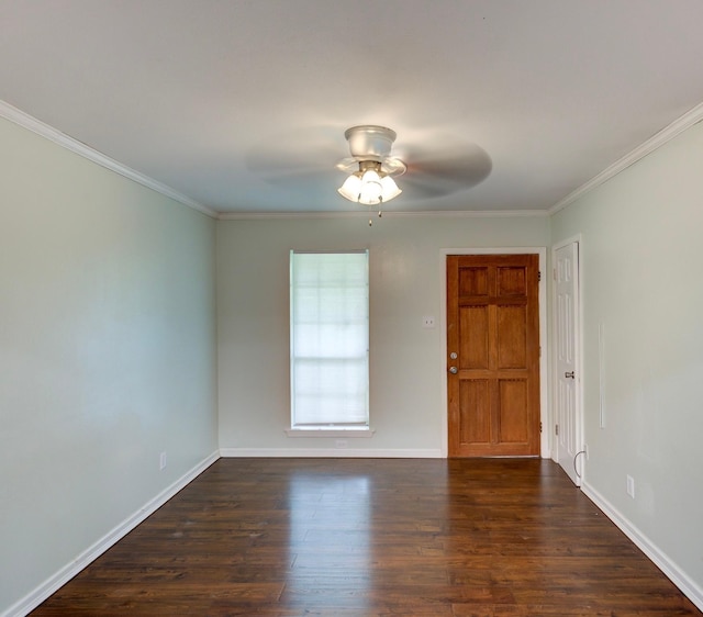 empty room featuring ornamental molding, ceiling fan, and dark hardwood / wood-style flooring