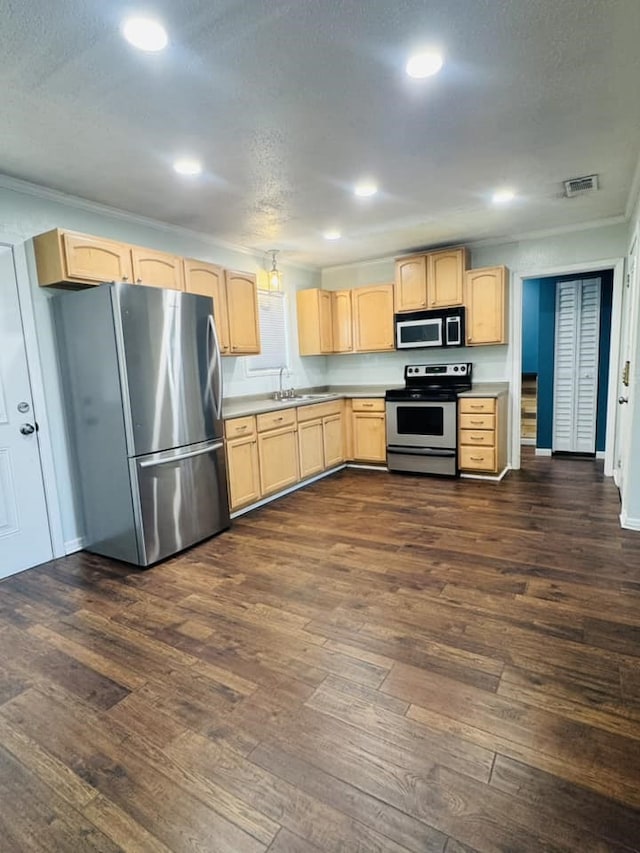 kitchen featuring dark wood-type flooring, sink, crown molding, light brown cabinets, and stainless steel appliances