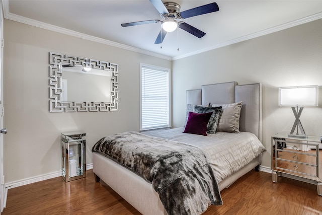 bedroom featuring ceiling fan, ornamental molding, and dark hardwood / wood-style flooring