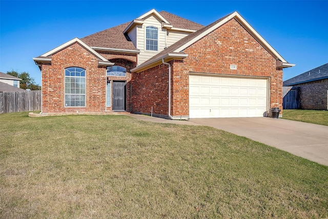 front of property with a garage and a front yard