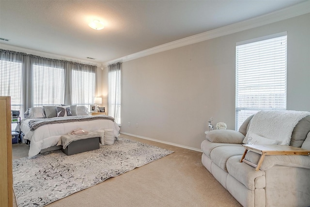 bedroom featuring multiple windows, ornamental molding, and carpet flooring