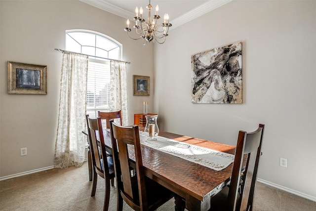 carpeted dining space with ornamental molding and a chandelier