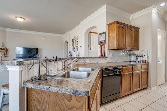 kitchen with sink, dishwasher, kitchen peninsula, and light tile patterned floors