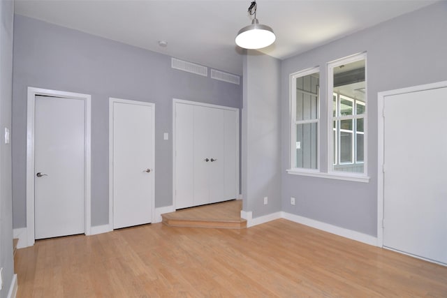 empty room featuring light hardwood / wood-style floors