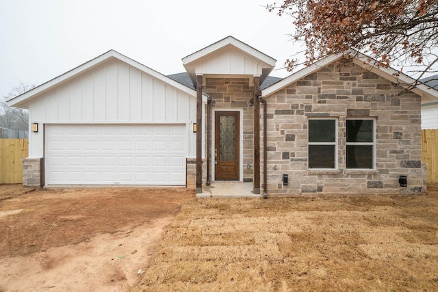 view of front of property with a garage